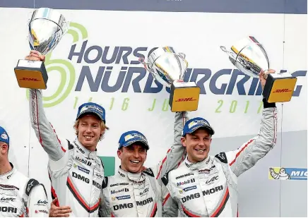  ?? PHOTO: PORSCHE ?? The Porsche team of Brendon Hartley (New Zealand), left, Timo Bernhard (Germany) and Earl Bamber (New Zealand) won the six-hour race at Nurburgrin­g.