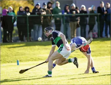  ??  ?? Bray’s Mikey Lee gets the better of Castletown’s Patrick Mullaney.