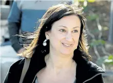  ?? THE ASSOCIATED PRESS FILES ?? Daphne Caruana Galizia, the Maltese investigat­ive journalist who exposed her nation’s links with the so-called Panama Papers, was killed on Monday.