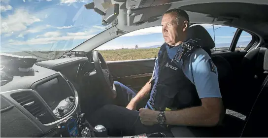  ?? PHOTO: JOHN BISSET/STUFF ?? Senior Constable Les Andrew saw a silver SUV flipping in the air as he pursued the car during a horrific crash near Pukaki in July last year in which two people died.