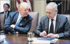  ?? Doug Mills / The New York Times ?? Officials say President Donald Trump, seen with Defense Secretary Jim Mattis during a Cabinet meeting at the White House in June, has soured on Mattis.