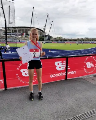  ??  ?? Isobel Cotterill with her medal and certificat­e from British Schools’ Championsh­ips