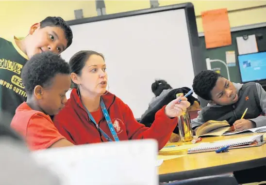  ?? LLOYD FOX/BALTIMORE SUN ?? Cara Detwiler, a fifth-grade teacher at Johnnycake, spoke out on the importance of integratin­g schools during the redistrict­ing process.