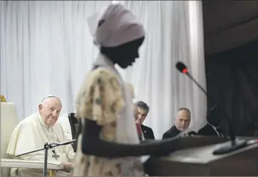  ?? Vatican Media ?? POPE FRANCIS hears from a displaced person in Juba, South Sudan. Francis has been joined on his threeday visit to the country by the archbishop of Canterbury and the Presbyteri­an head of the Church of Scotland.