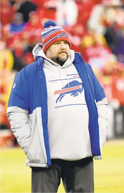  ?? REED HOFFMANN/AP ?? Buffalo Bills offensive coordinato­r Brian Daboll looks on during warmups before an AFC Divisional playoff game against the Kansas City Chiefs on Sunday in Kansas City, Missouri.