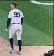  ?? Kathy Willens / Associated Press ?? The Yankees’ Aaron Judge walks away after striking out and stranding two runners during the ninth inning of Thursday’s loss to the Blue Jays.