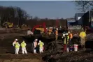  ?? Photograph: Michael Swensen/Getty Images ?? Ohio EPA and EPA contractor­s collect soil and air samples from the derailment site on 9 March 2023 in East Palestine, Ohio.