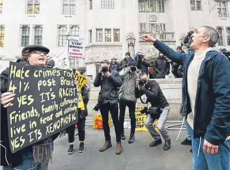  ?? Picture: PA. ?? Protesters outside the Supreme Court in London on the second day of the Government’s appeal against the High Court’s ruling that MPs must have a say on triggering Brexit.