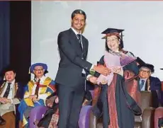  ??  ?? Boris Chitombo (standing left), an internatio­nal student, graduating with a diploma in informatio­n technology from HELP University recently.