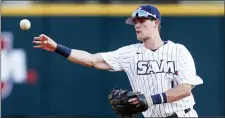  ?? ASSOCIATED PRESS FILE PHOTO ?? Samford infielder Brooks Carlson (14) throws to first during a college baseball game in Birmingham, Ala last year.