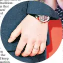  ??  ?? Ed Sheeran and Cherry Seaborn, his fiancée, at the Brit Awards. Inset, his engagement ring