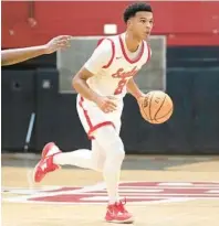  ?? WILLIE J. ALLEN JR./ORLANDO SENTINEL ?? Edgewater junior guard Erik Taylor led the Eagles in scoring in Saturday’s Class 6A district final win at top seed Wekiva.