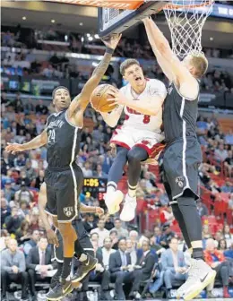  ?? WILFREDO LEE/AP ?? Miami Heat guard Tyler Johnson moved back into rotation, with the reserve guard entering with 2:45 left in the opening period.