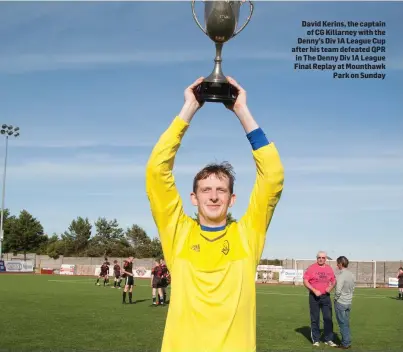  ??  ?? David Kerins, the captain of CG Killarney with the Denny’s Div 1A League Cup after his team defeated QPR in The Denny Div 1A League Final Replay at Mounthawk Park on Sunday