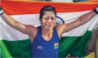  ??  ?? ↑ Mary Kom says her focus is to win gold for India at the Olympic Games.