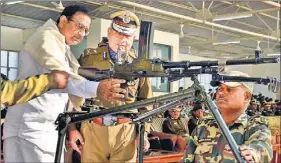  ?? PARVEEN KUMAR / HT PHOTO ?? Union home minister P Chidambara­m fires from a light machine gun at the CRPF Academy at Kadarpur in Gurgaon on Wednesday