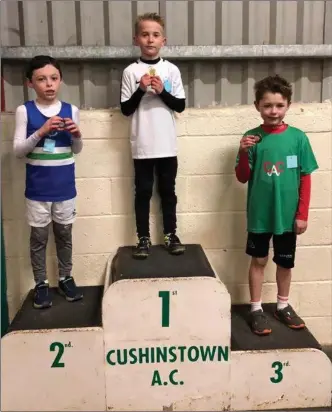  ??  ?? Under-9 sprint winner Nathan Robertson pipped athletes from Ardee &amp; District (left) and Cushinstow­n to take first place.