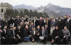  ?? WAM ?? Shaikh Mohammad with his delegation at the Great Wall of China yesterday.