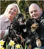  ??  ?? HAPPY Lotto winners Laura & Kirk with dogs