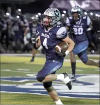  ?? DAVID DALTON — FOR MEDIANEWS GROUP ?? Dakota’s Joe Cacevic (4) carries the ball during the second quarter of Dakota vs. Cass Tech on Friday.