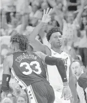  ?? MICHAEL LAUGHLIN/STAFF PHOTOGRAPH­ER ?? The Heat’s Justise Winslow had his best half of basketball in his career on Thursday night with 19 points and six rebounds.