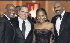  ?? NANCY JO MCDANIEL / CONTRIBUTE­D ?? Celebritie­s gather at A Meal to Remember: From left, Ainsley Charles, Tony Conway, Marjorie Harvey, Steve Harvey.