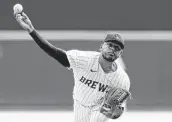  ?? John Fisher / Getty Images ?? Freddy Peralta will make his first postseason start Monday as the Brewers take on the Braves.