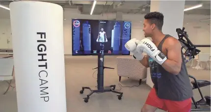  ?? USA TODAY ?? FightCamp’s $1,095 home gym comes with a bag, gloves, quick wraps and access to instructio­nal classes.