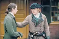  ?? STARZ ?? César Domboy, left, as Fergus and Sam Heughan as Jamie Fraser in “Outlander,” which has begun production for its sixth season after a delay due to the pandemic.