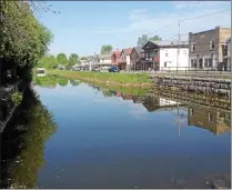  ?? DISPATCH STAFF PHOTO ?? The Erie Canal stretches along the village of Canastota on Monday, May 11, 2015.