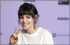  ?? CHRIS PIZZELLO — ASSOCIATED PRESS ?? Kristen Stewart, a cast member in “Love Me,” gestures to photograph­ers at the premiere of the film at Eccles Theatre during the Sundance Film Festival on Jan. 19.