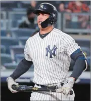  ?? JULIE JACOBSON/AP PHOTO ?? Slugger Giancarlo Stanton, who has struggled in his first month withe the Yankees, reacts after striking out against Miami on Tuesday night in the Bronx.