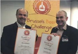  ??  ?? Eugenio Caruana (left), Head of Production at the Farsons Brewery, with Thomas Costenoble, Director of the Concours Mondial de Bruxelles