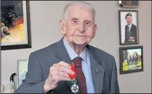  ??  ?? Eion McEwan, 94, has been bestowed with France’s highest honour, the Legion D-Honneur, in recognitio­n of his bravery