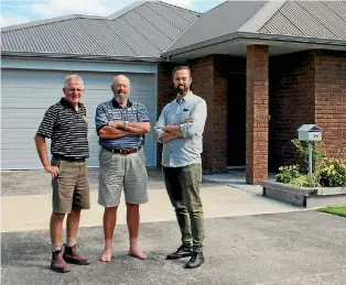  ?? PHOTO: REXINE HAWES/STUFF ?? Builder Richard Coleman, Passive House architect Brooke Cholmondel­ey-Smith and home owner Allan Bates in front of Bates’ PassivHaus – the first of its kind to be built in Matamata and the second for Waikato.