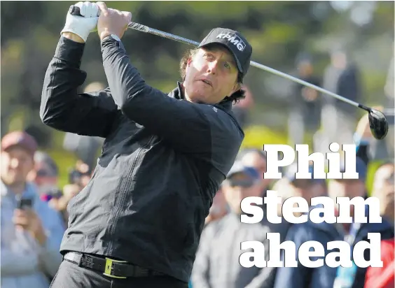  ?? Photo / AP ?? Phil Mickelson follows his drive from the fourth tee on his way to winning the AT&amp;T Pebble Beach Pro-Am.