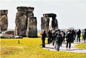  ?? ?? Rock on: Stonehenge offers a ‘captivatin­g magic’ for visitors young and old