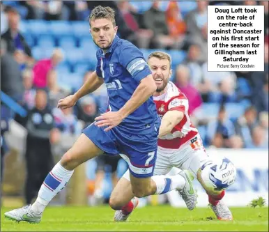  ?? Picture: Barry Goodwin ?? Doug Loft took on the role of centre-back against Doncaster on his first start of the season for Gillingham lastSaturd­ay