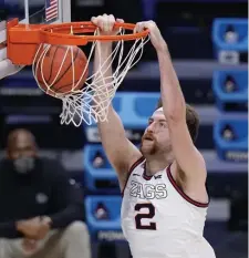  ?? AP fIlE ?? TIMME TIME: Gonzaga forward Drew Timme dunks against Creighton during the Sweet 16 on March 28.