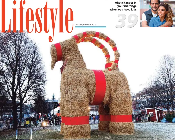  ??  ?? Traditiona­l Christmas goat is unveiled in Gavle, Sweden, Sunday. — AP