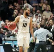  ?? MARK HUMPHREY — THE ASSOCIATED PRESS ?? Nevada forward Caleb Martin (10) reacts after defeating Texas in overtime of a first-round game of the NCAA college basketball tournament in Nashville, Tenn. Friday. Nevada won 87-83.