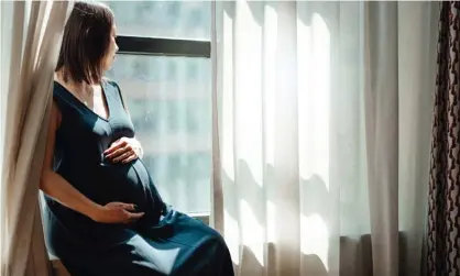  ??  ?? ‘Thoughtful friends sent messages of commiserat­ion, about how difficult it is to be pregnant in lockdown, and was I OK? It’s the fact that I was that was most jarring.’ Photograph: Oscar Wong/Getty Images