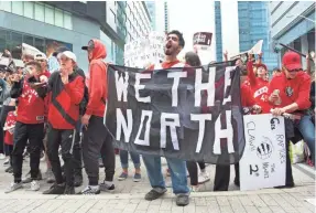  ?? NICK TURCHIARO/USA TODAY SPORTS ?? A fan holds a sign with the Raptors’ slogan ‘We The North,’ which was coined six years ago.