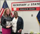  ?? ?? Secretary Benson and Laurie Moore, niece of former Secretary of State Richard H. Austin, celebrated Black History Month paying tribute to Secretary Austin and his historic accomplish­ments for the State of Michigan.