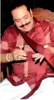  ?? ?? MAHINDA: Rolling the mystic talisman to and fro on his palm