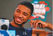  ?? THE ASSOCIATED PRESS ?? Villanova’s Mikal Bridges laughs during a news conference Sunday in advance of tonight’s championsh­ip game against Michigan.