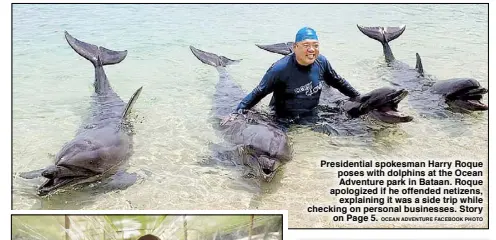  ?? OCEAN ADVENTURE FACEBOOK PHOTO ?? Presidenti­al spokesman Harry Roque poses with dolphins at the Ocean Adventure park in Bataan. Roque apologized if he offended netizens, explaining it was a side trip while checking on personal businesses. Story on Page 5.