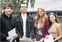  ??  ?? On the left is former pupil from The Heath, Michael Rawlinson and third from left, Lucy Bridson from Runcorn