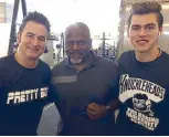  ??  ?? Las Vegas-based internatio­nal matchmaker Sean Gibbons (left) and son Brendan flank referee Malik Waleed.