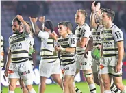  ??  ?? DANGER La Rochelle celebrate after beating Harlequins